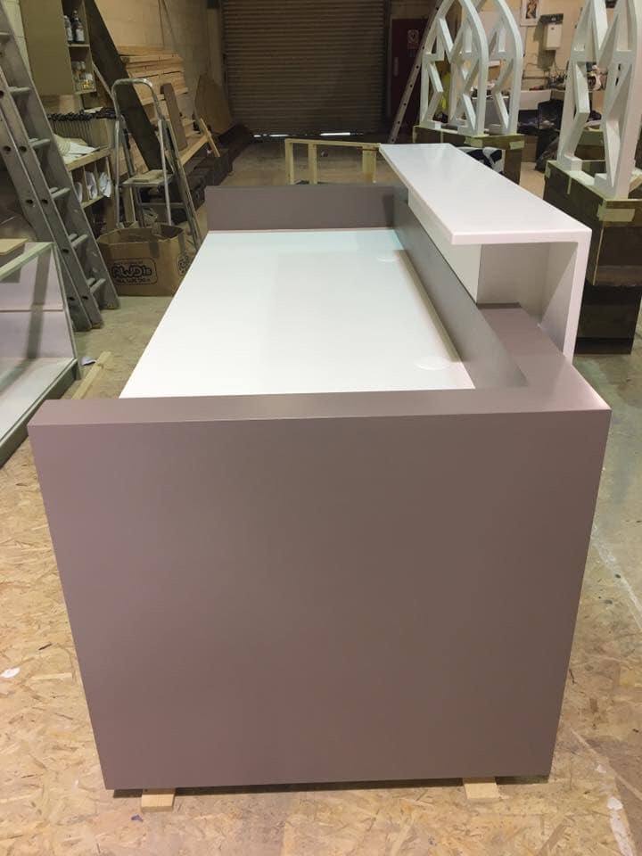Reception desk with grey and white finish