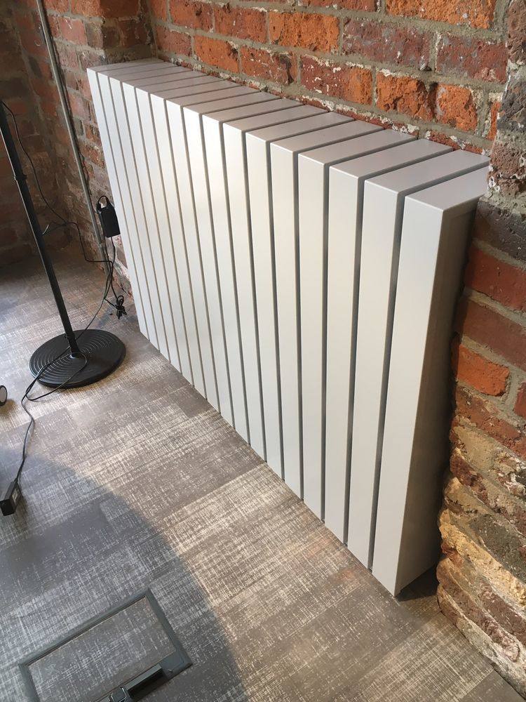 Slatted radiator cover