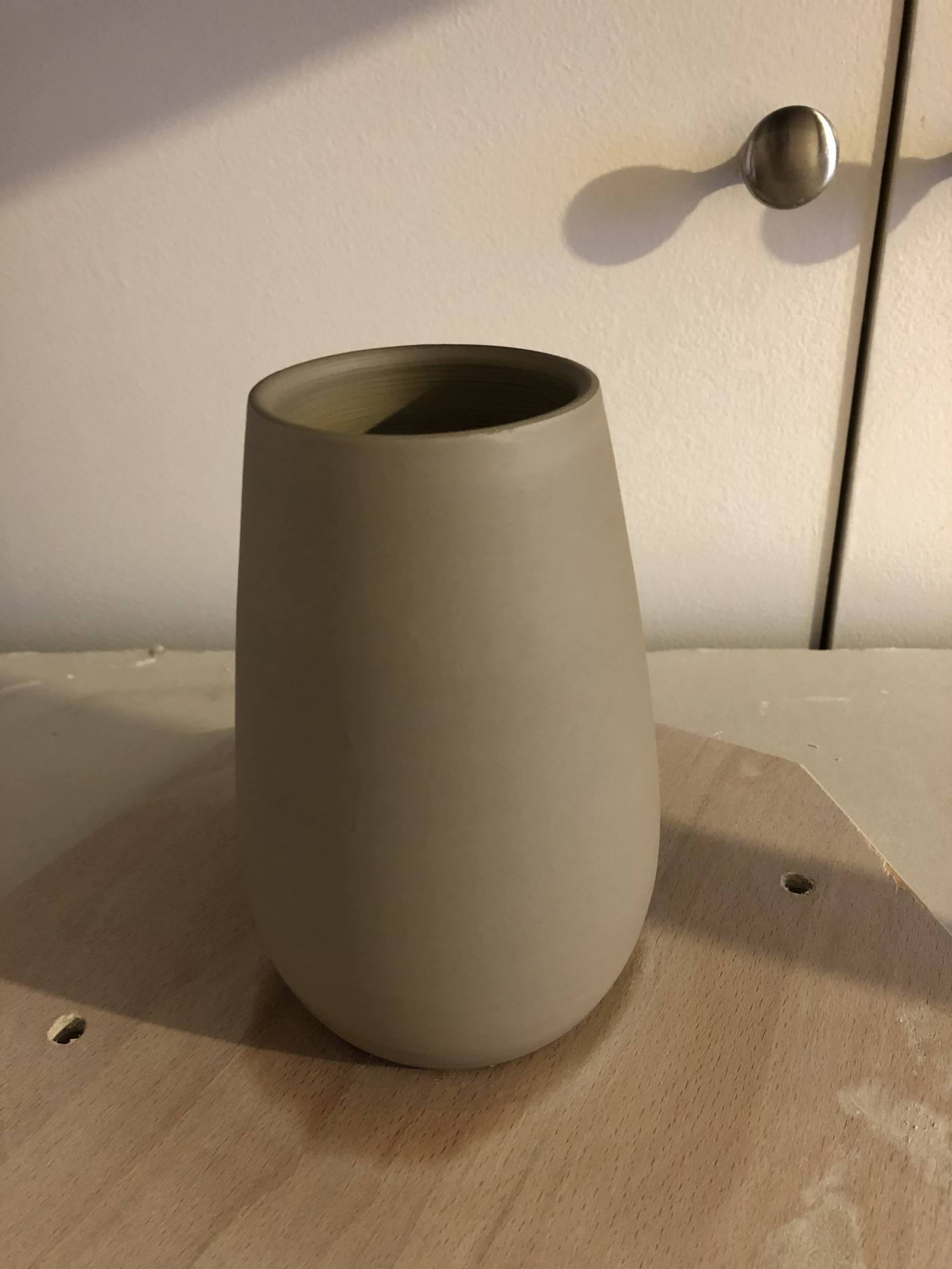Tall grey ceramic vase
